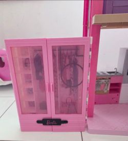 Barbie house, ambulance, camper, jeep, little car, closet and barbies