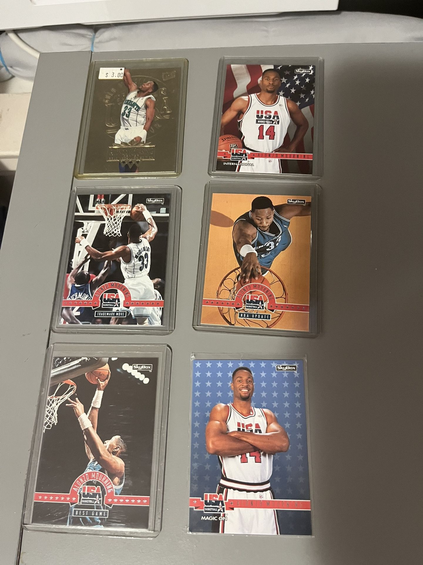 6 Alonzo Mourning Basketball cards, 1 Fleer Ultra Gold Medallion Edition, 5 Skybox Cards