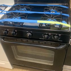GE 4 Burner Gas Stove In Black Working Perfectly 4 Months Warranty .