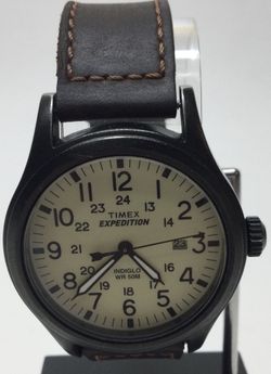Timex Expedition Scout 40mm (T49963) Featuring A Cream-Colored Dial, Full Arabic Numerals, Dark Matte Case, & Brown Leather Strap