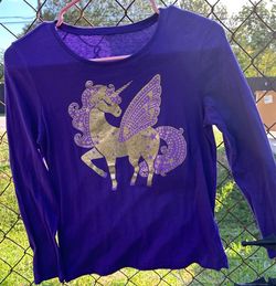 9 girls’ shirts