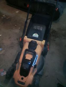 Used Black and Decker 40 volt lawn mower and battery with charger