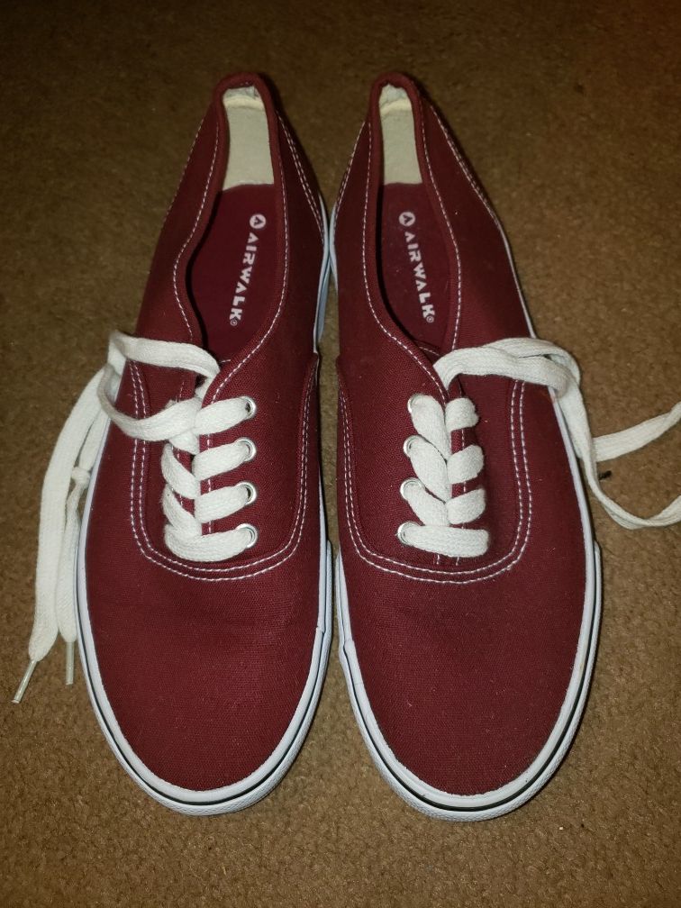 Maroon Airwalk shoes.