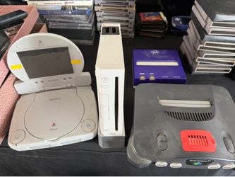 Large lot of video game games and vintage consoles