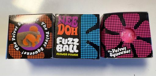 Fuzz Ball Squish Toy in Pink, Purple, Blue and Orange