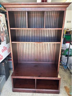 Large dark solid wood media hutch