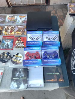 4 Sealed Controllers. A New Conditions Playstation 3 PS3 slim 500GB with all Cables. & 14 Disc Games but 1 Is Limited edition Steelbook with book game