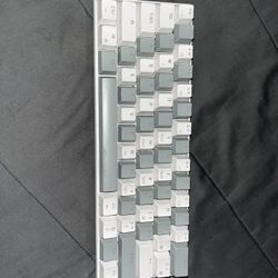 Gaming keyboard with coiled cable