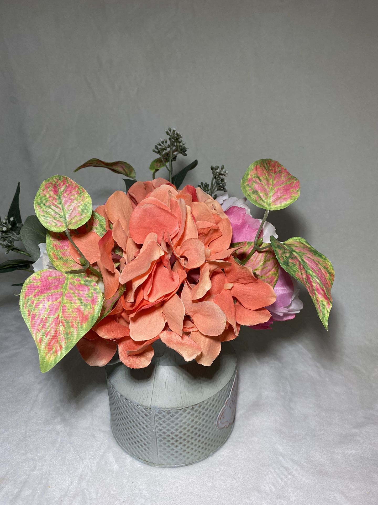 Flower Arrangement In A Metal Vase