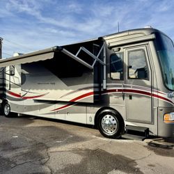 06 newmar mountain aire 43ft tag axle with 4 slide outs 400HP Cummins