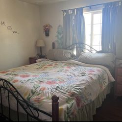 CAL KING MATTRESS AND BOX SPRINGS WOOD AND BLACK ROD IRON HEADBOARD AND FOOT BOARD