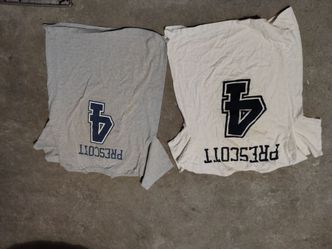2 used shirts,, medium..$10 for both .. cowboys