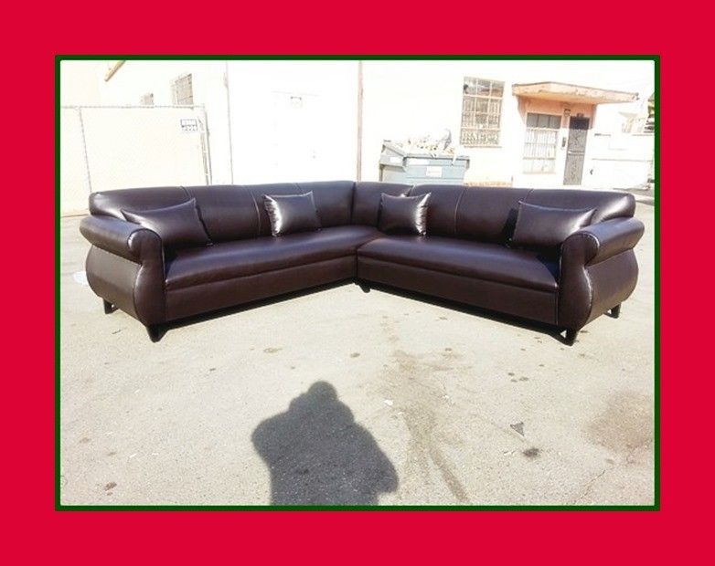 new 9x9 ft "Brown leather" sectional couches