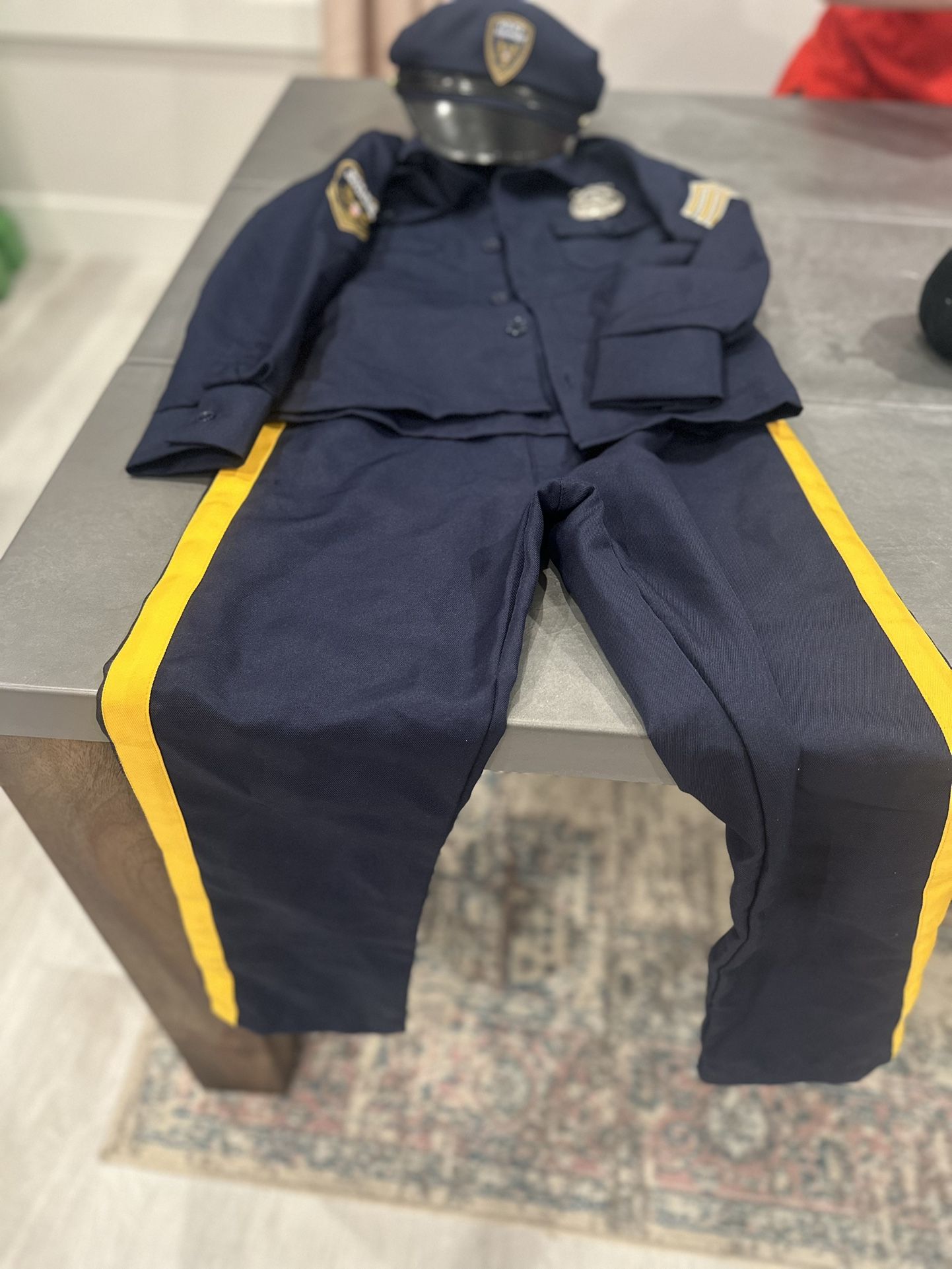 Kids Size Medium Spirit Halloween Official Deluxe Police Costume - Uniform, Hat, Belt, Walkie Talkie, Handcuffs New Condition