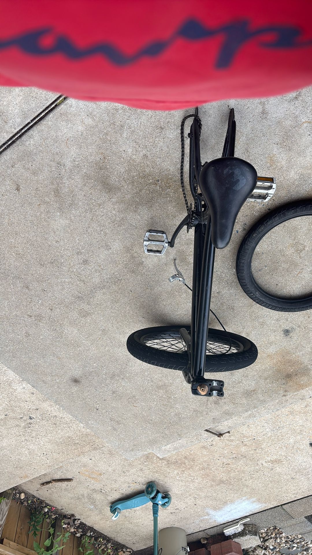 Bike frame with brakes at tire and a clamp and the stem and the chain all functional just needs a back tire in handlebars by handlebars are inclcluded