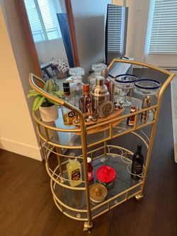 Like new! Gold Metal Bar Cart with Glass Shelves