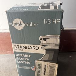 Garbage disposal -New open box