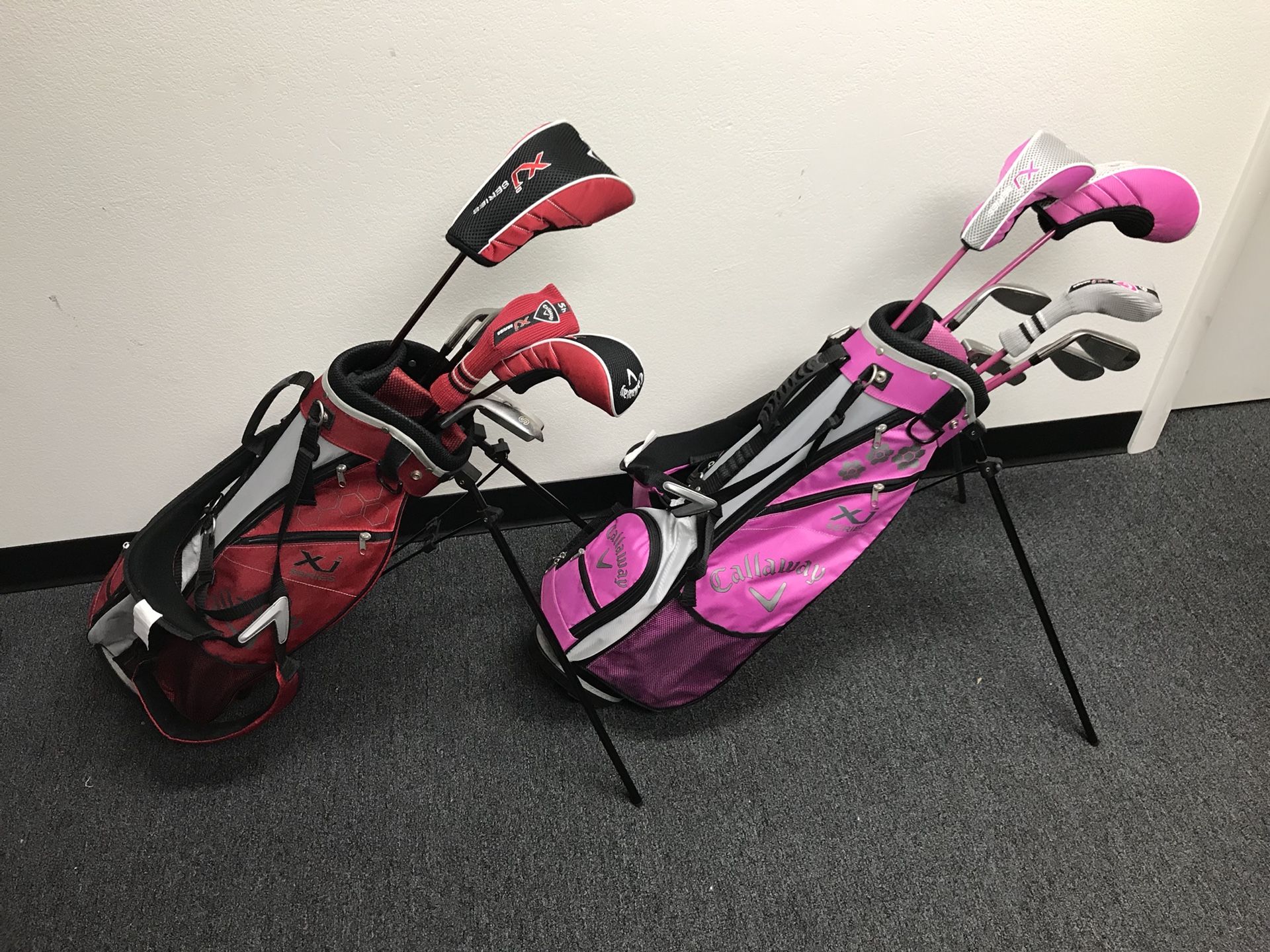 (2) Callaway XJ Series junior golf sets (Girls Pink and Boys Red)