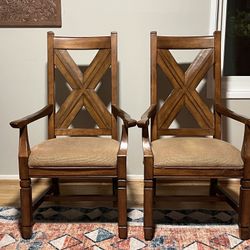 Two Wooden Arm Chairs