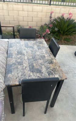 Table And 4 Chairs