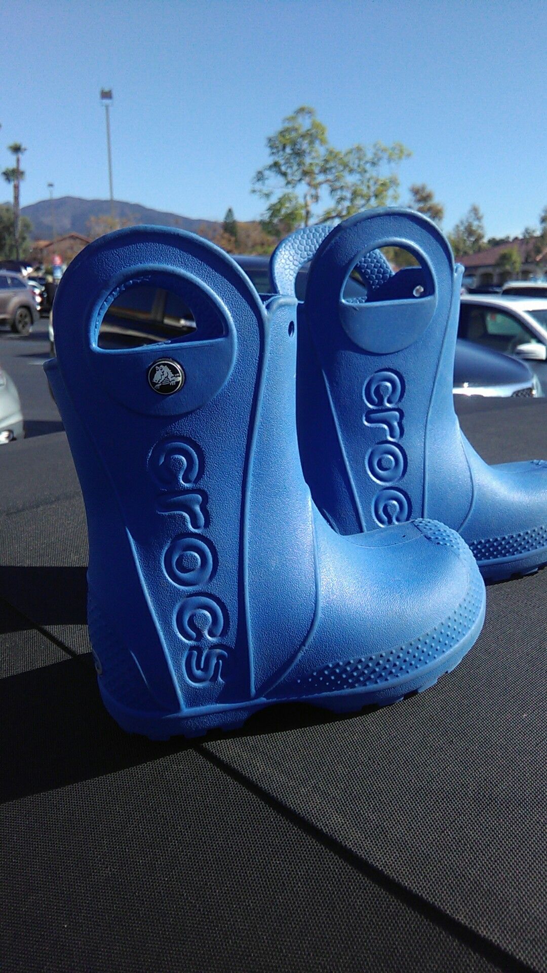 Kids size 8 Crocs rain boots in brand new condition