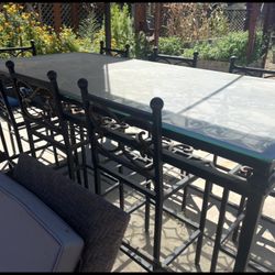 Gorgeous Solid Metal Table With Glass Top And 8 Chairs 