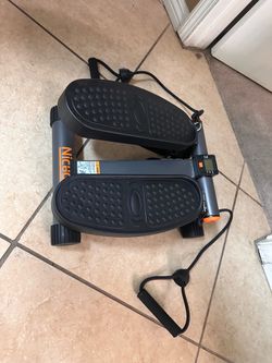 Stairstepper with resistance arm bands