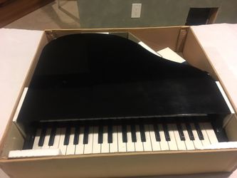 Mini grand piano