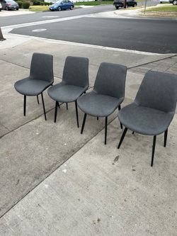 Brand new 4 luxury dining chairs for  $120