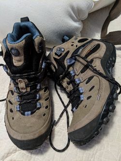 Women's size 7 brand new merrell boots , salomon sneakers and brand new sketchers $28 each or all 3 for $75