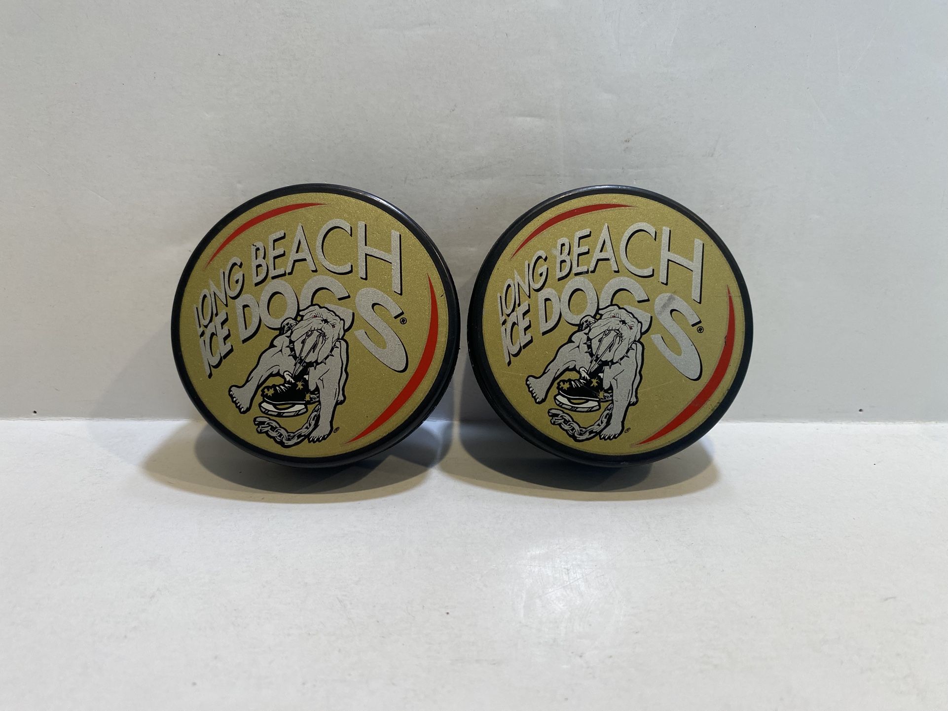 Pair of Collectible Long Beach Ice Dogs ECHL Souvenir Hockey Pucks