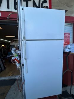 White top-freezer refrigerator