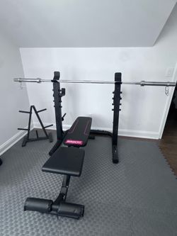 Workout Bench and Olympic Barbell and more..