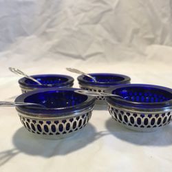 4 Cobalt gl  ass salt cellars in sterling holder with original sterling salt spoons