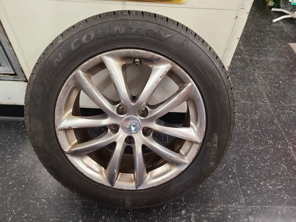 Infiniti G35x OEM rims with TOYO tires