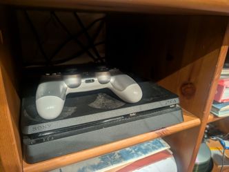 PS4 Slim 1TB + Controller & Cables Refurbished