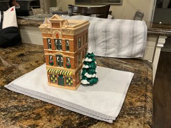 The Original Snow Village — Toy Shop Introduced: 1986 Item number: 5073-3 Material: Hand-painted ceramic Origin: Taiwan Your building's brick facade, 