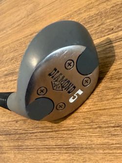 Diamond XX 5 wood golf club. Gray head with steel sole plate. Number 5 marked on sole. Solid casual-use club. Diamond 5 driver with black grip #golf #