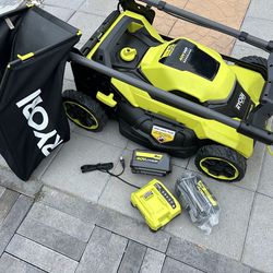 40V HP Brushless
21 in. Cordless Battery Walk Behind Self-Propelled Lawn Mower with (2) 6.
Ah Batteries and
Charger