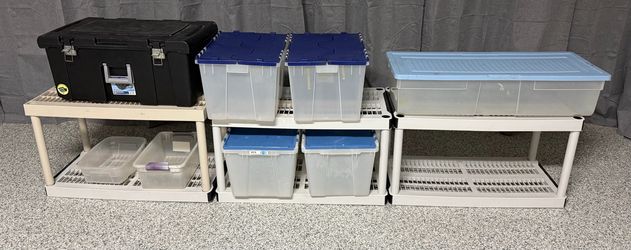 Lot of storage bins with covers and shelves. Will sell separately or as a set. Make an offer.