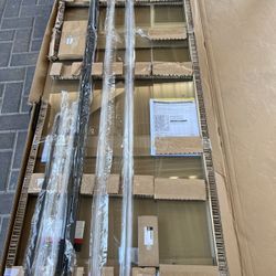 Wilder 30 to 36 in. W × 71-3/4 in. H Frameless Pivoting Shower Door in Nickel with 1/4 in. Clear Glass