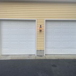 2 steel installed garage doors in great condition, Comes with hardware, 2 door remote  This would be perfect if you building a shed. The doors will be
