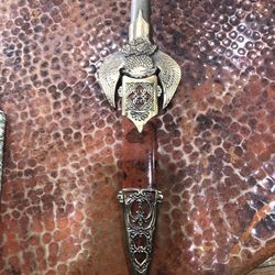 Fancy letter opener, very detailed.