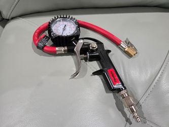 New in box PowRyte Pistol Tire Inflator with 100psi Gauge and Chuck