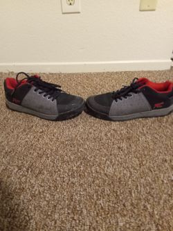 Black grey red shoes