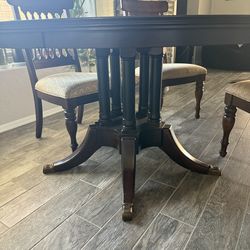 Dining room table 60” w/four chairs.