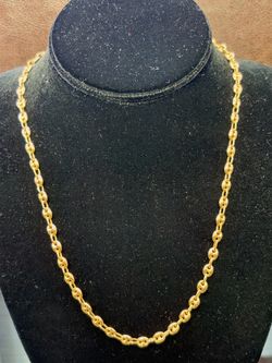18k Gold Gucci link chain 18 grams 21”