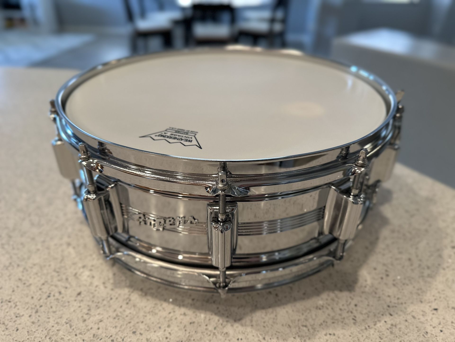 Vintage Rogers Dynasonic chrome over brass snare drum