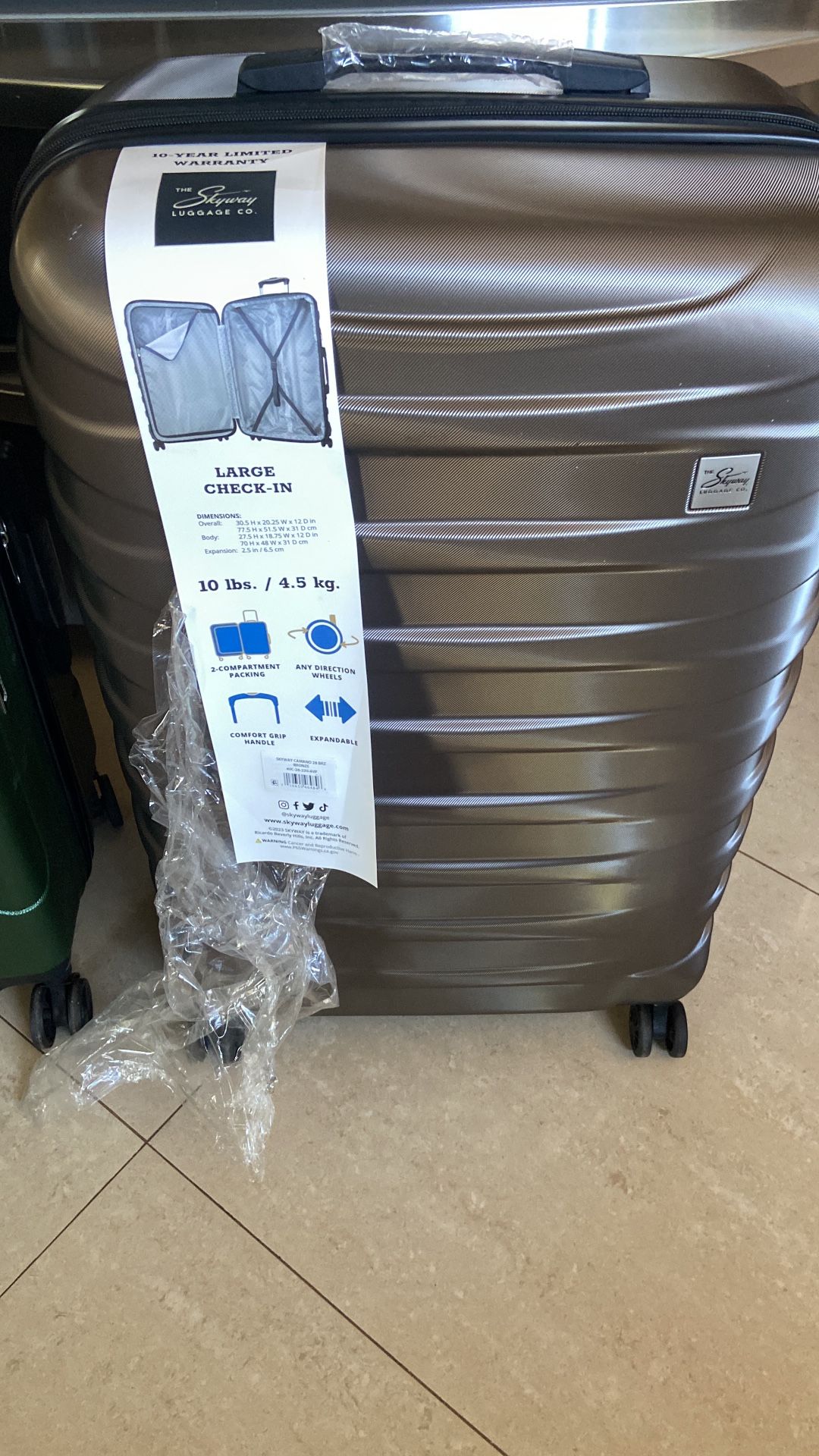 Skyway Luggage Camano Hardshell 28" Expandable Large Checked Luggage with Spinner Wheels, Bronze