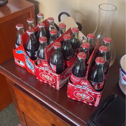 24 vintage Coke bottles Unopened $28
